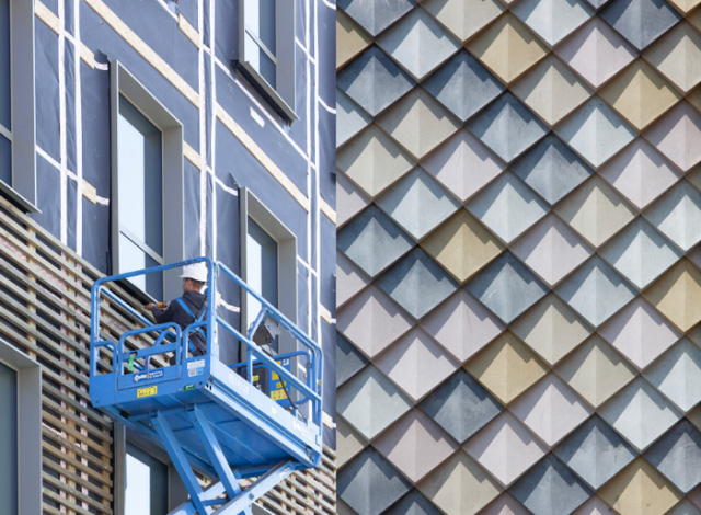 Pretty plastic tiles cladding a building